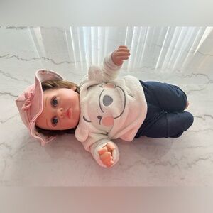 Adorable Pink and‎ White Doll with Hat